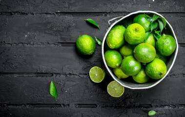 Ripe fragrant lime in a bucket.