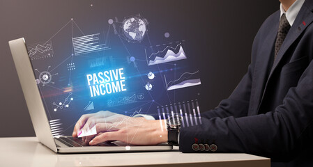 Businessman working on laptop, business concept