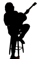A silhouette of a guitar player on a stool