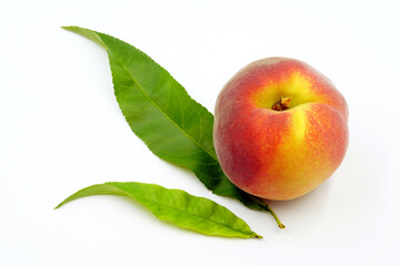 Delicious peach isolated on white. A fruit with a velvety skin.