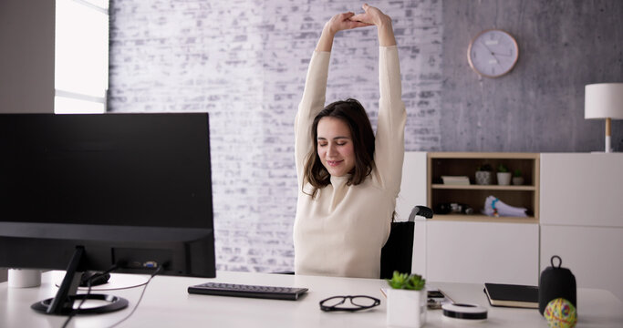 Arms Stretch Exercise Sitting At Desk