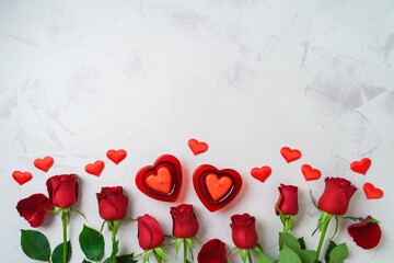 Happy Valentine's day  background with heart shape candle and rose flowers. Top view, flat lay