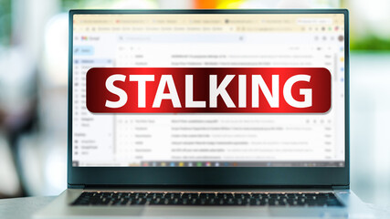 Laptop displaying the sign of stalking on the internet