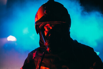 A close up of firefighter in a smoke