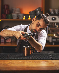 Barman squeezes lemo