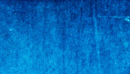 Background of old crumpled blue synthetic fabric.