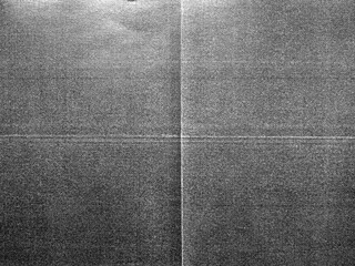 Texture of folded paper, top view or detail scan of paper surface, cool printed photo effect...