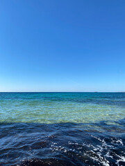 Obraz premium Small ripples on the water. Blue water of the Mediterranean Sea. February, Cyprus.