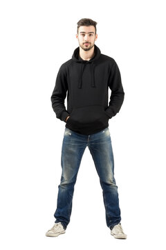 Confident man in hood with hands in pockets isolated on transparent background