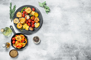 Various grilled vegetables with spices and herbs.