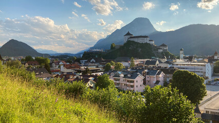 Cityscape of Kufstein, Austria with the Kufstein castle on a hill and the Pendling Mountain in the...
