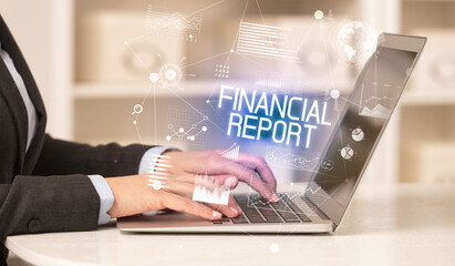 Side view of a business person working on laptop