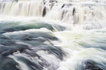 Fototapeta na wymiar natural abstract flow background of water. natural abstract flow background
