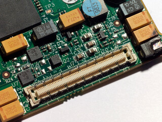 A computer circuit board with fire damage