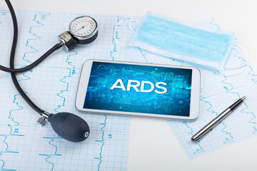 Close-up view of a tablet pc with medical abbreviation