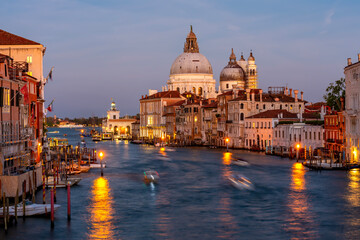 Fototapeta na wymiar Grand canal and Santa Maria della Salute church at sunset, Venice, Italy