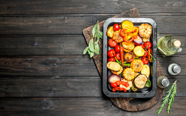 Different grilled vegetables with herbs and spices.