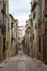 Montpellier, Occitanie, France - Narrow alley in mediterranean style
