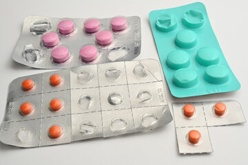 Various drugs, opened and unopened painkiller pills
