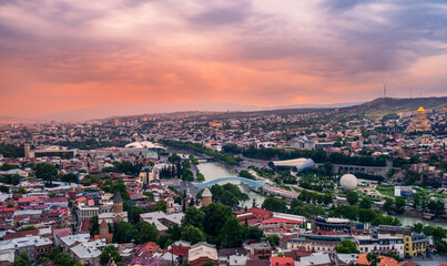 Old Tbilisi cityscape with Mtkvari or Kura river, Cathedral, bridge of peace, Rike park and...