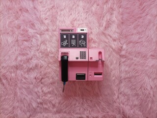 Telefono rosa a gettoni