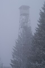 Fire tower in snowstorm