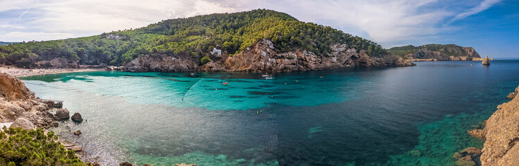 Cala Benirras beach with turquoise sea water, Ibiza island, Spain