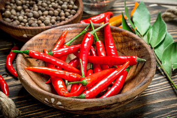 Pepper peas and peppers in a bowl on the tray.