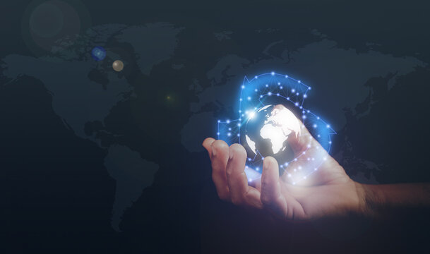 Hand holding recycle icon with virtual earth in hand and world map background, Nature protection and save energy for environment concept, sustainable development, Renewable energy.