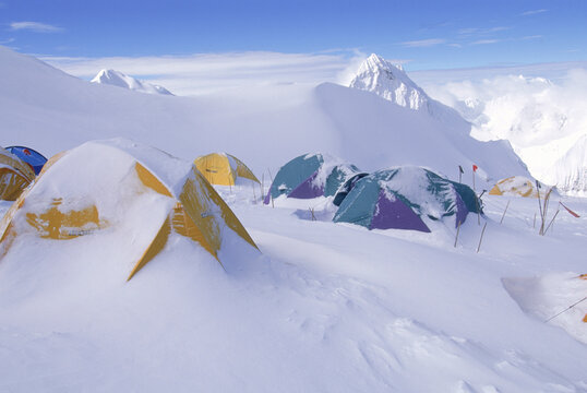 Snow covered tents at Camp 2, Cho Oyu, Tibet, China.