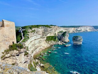 Fototapeta na wymiar Bonifacio (Corsica, France) view of rocky cliffs of Accore coast, stack of the Grain of Sand (
