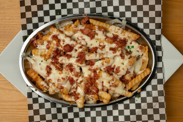 French fries with bacon and cheese