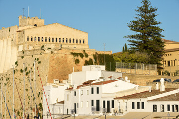 Low angle view of historic port town in menorca