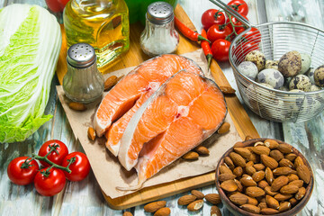 Healthy food. Salmon with honey, nuts and vegetables.