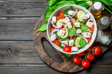 Vegetable salad. Salad with vegetables, cheese and olive oil.