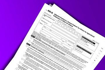 Obraz premium Form 943-X documentation published IRS USA 03.24.2021. American tax document on colored