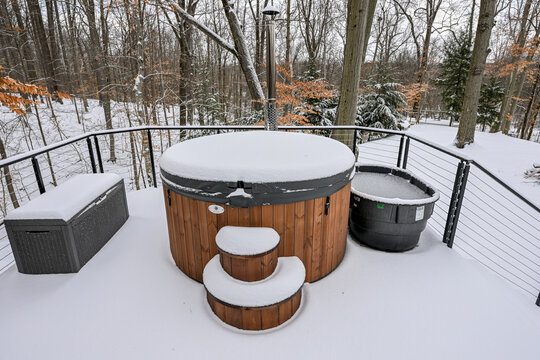 Aerial Wood Fired Hot Tub On A Deck In The Winter