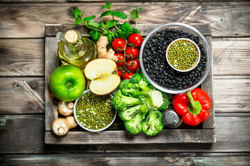 Healthy food. Healthy assortment of vegetables and fruits with legumes.
