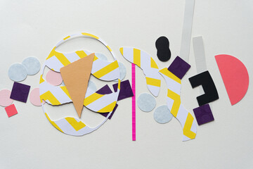 collection of various paper shapes on blank paper