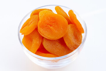 Dried apricots on white background.