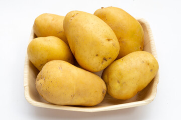 Raw potatoes isolated on white background