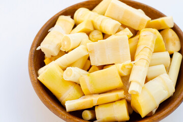 Bamboo shoots on white background.