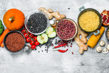 Organic food. Healthy assortment of vegetables and fruits with legumes.