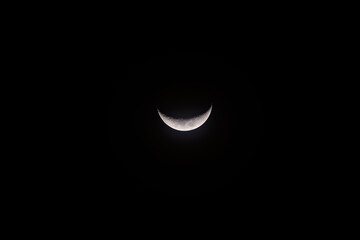 half moon in the dark sky 