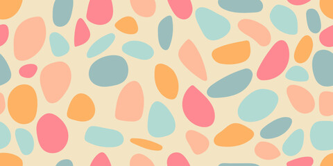 Colored round stones. A pattern of identical multi-colored pebbles. Seamless pattern for print.