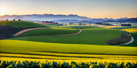 Fototapeta premium farm in farmland with a field of flowers and mountains in the background, with rolling hills and immaculate rows of crops.