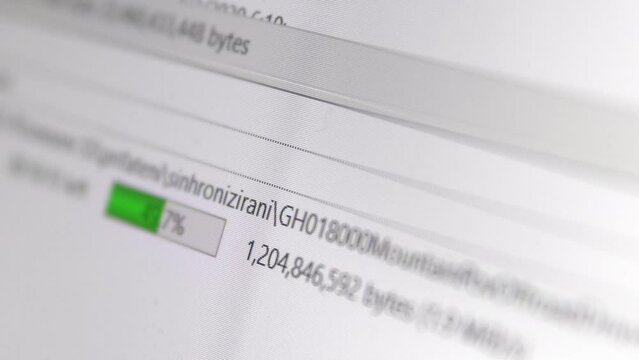 Download or Upload bars in action. Many files of Big data transfer to or from ftp server, selective focus