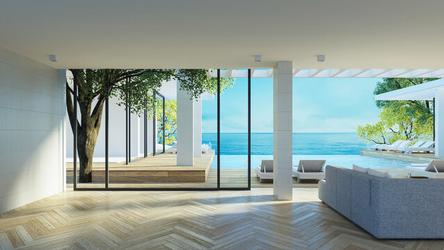 Beach luxury living room and Sea view interior - 3d rendering	