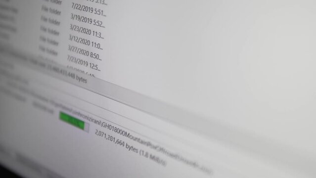 Screen of a modern digital device that displays file upload or download bar progress. Modern technologies.exchange or transfer of information.high speed internet, selective focus - Powered by Adobe