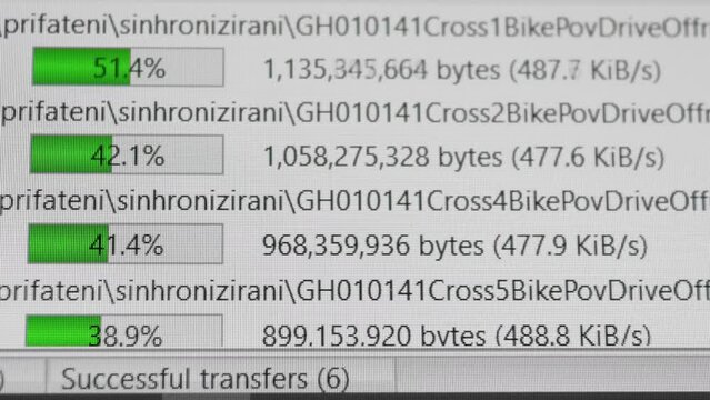 FTP Uploading progress bar transferring information on modern computer screen, selective focus